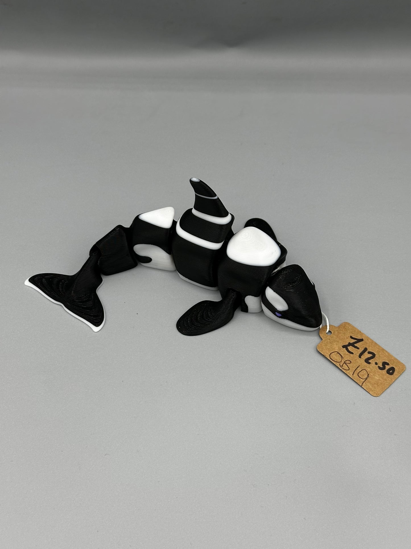 Articulated orca toy