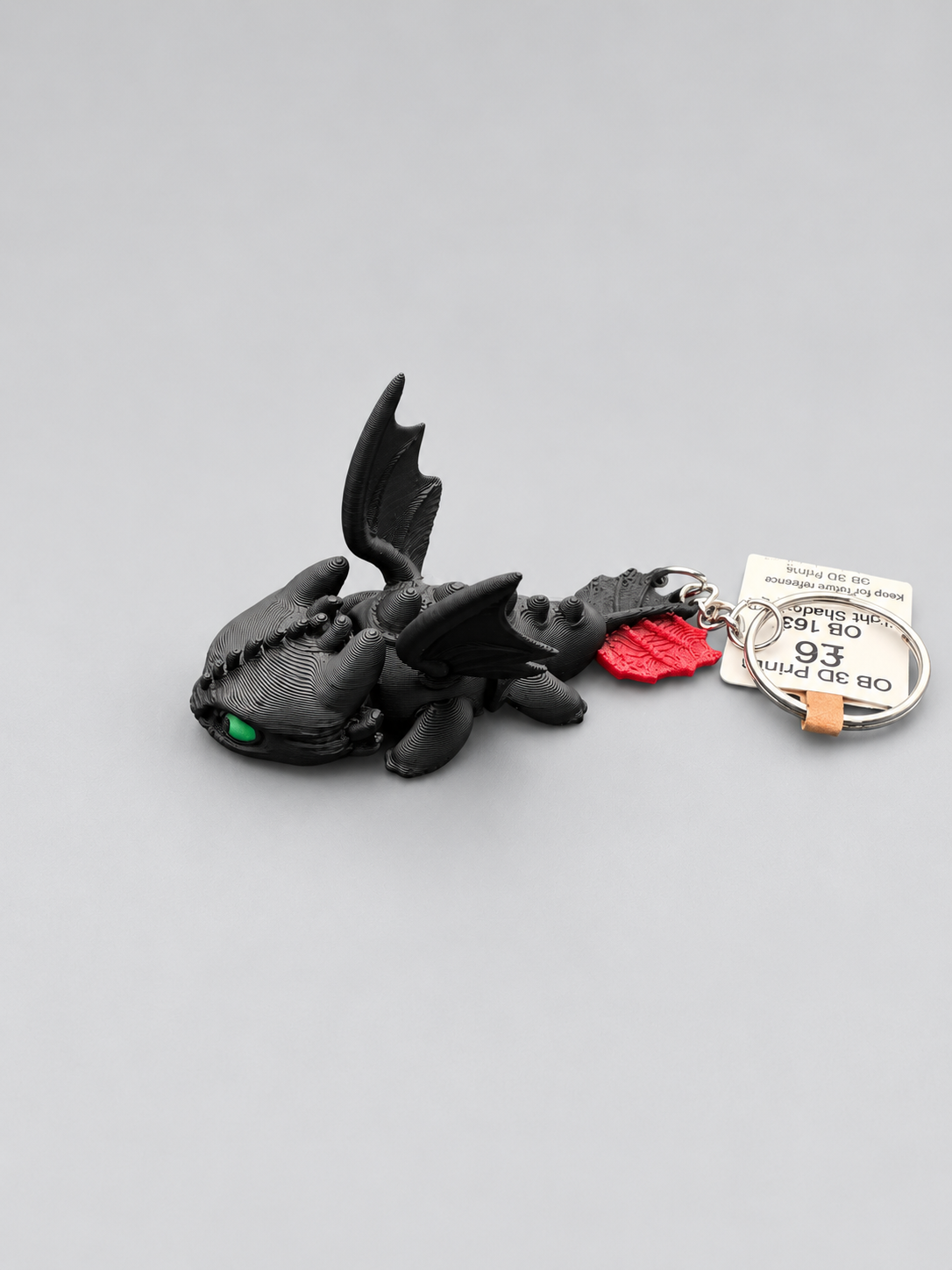 Articulated Night Shadow dragon keychain side view