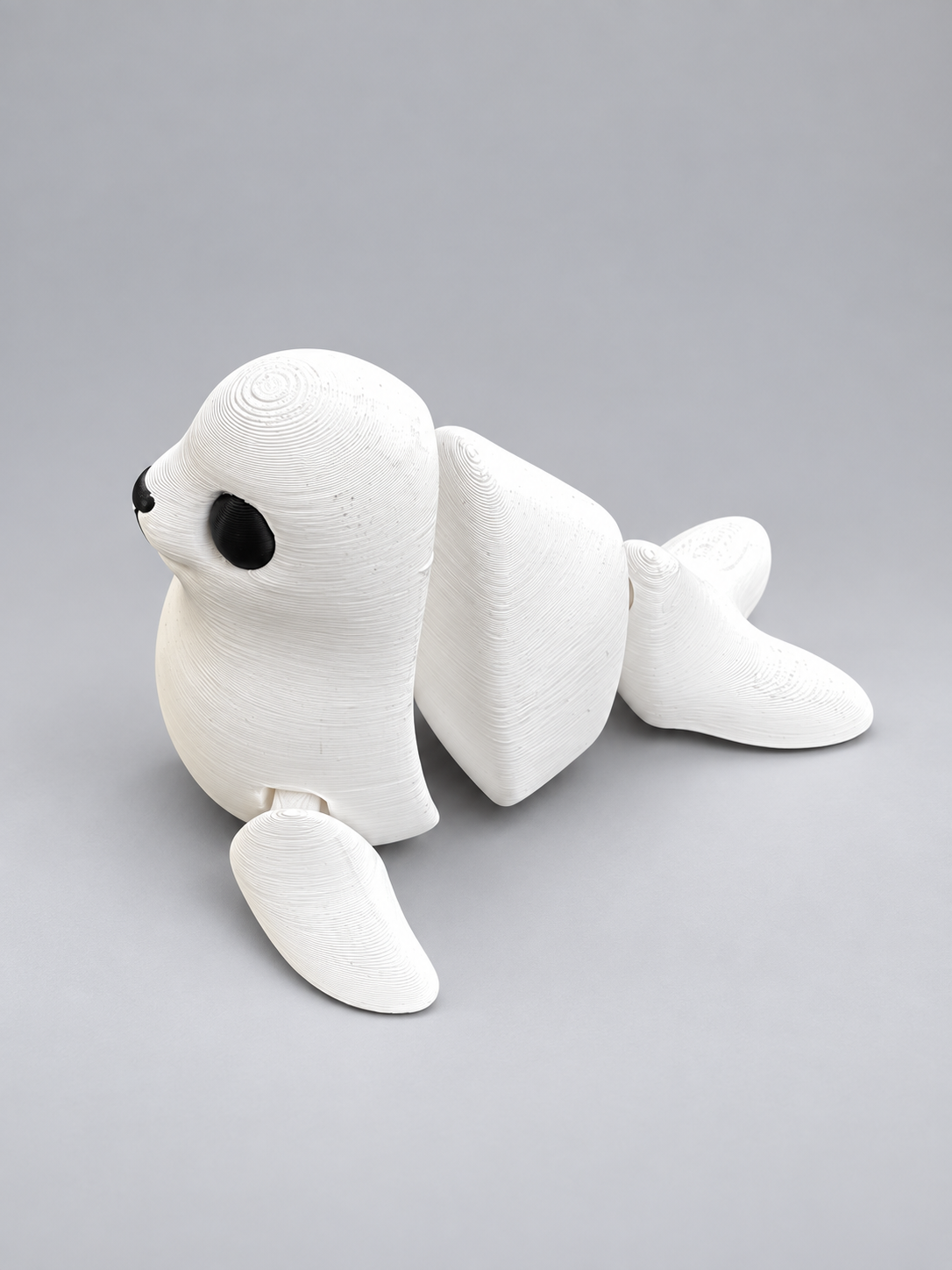 Articulated seal fidget side view