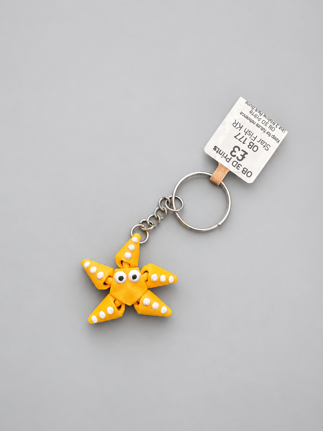 Yellow articulated starfish keychain