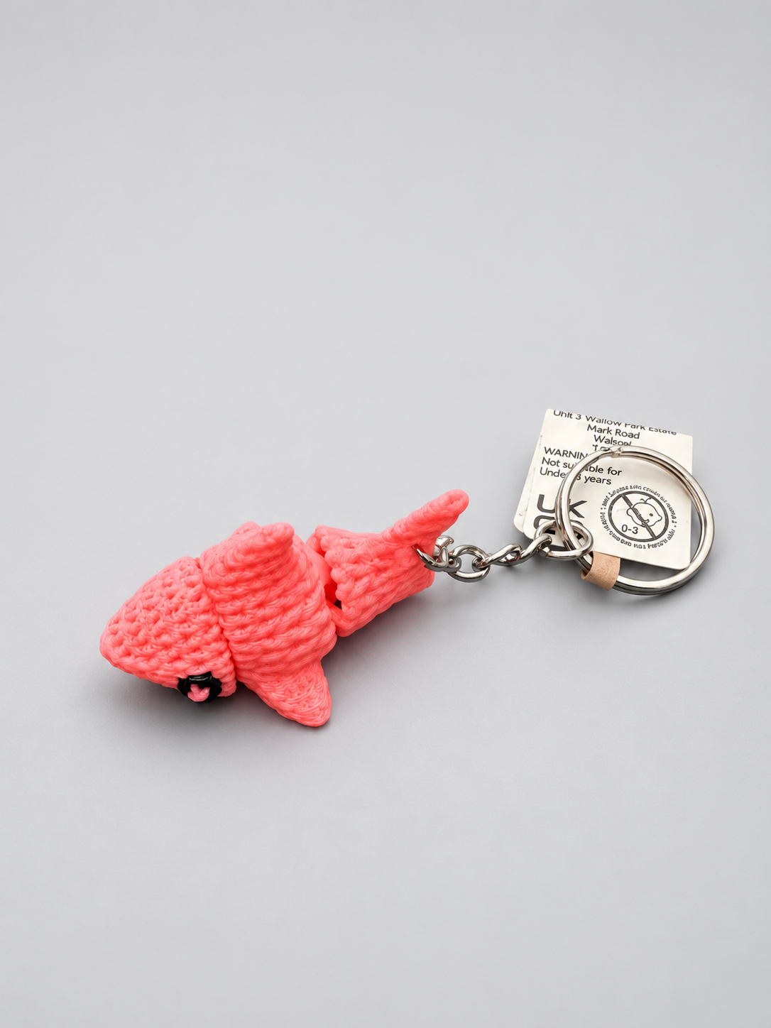 Pink knitted-style articulated shark keychain
