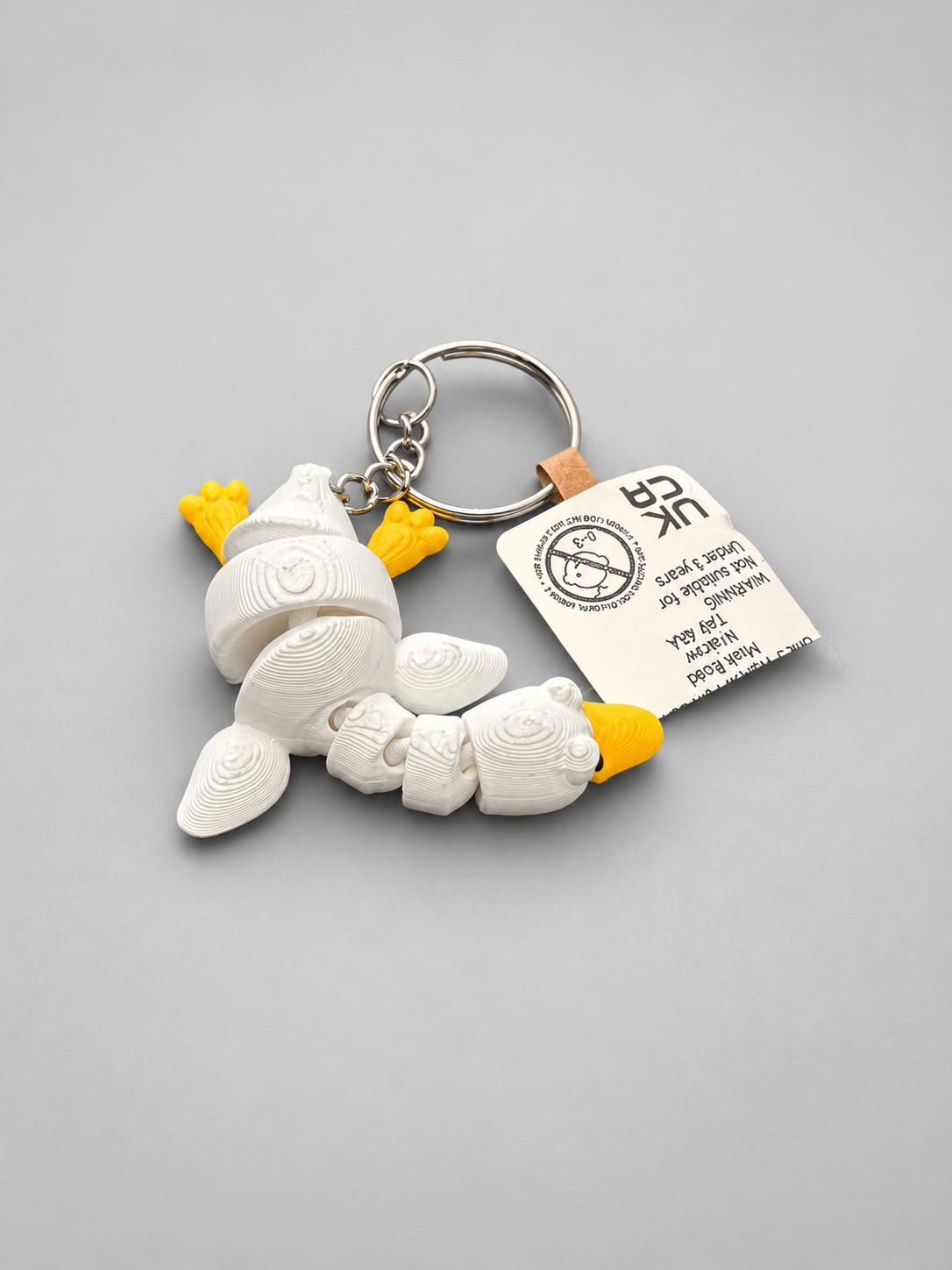 Silly Goose articulated keychain showing flexible body
