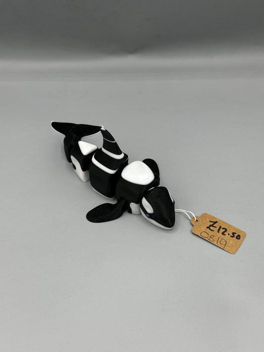 Articulated orca toy