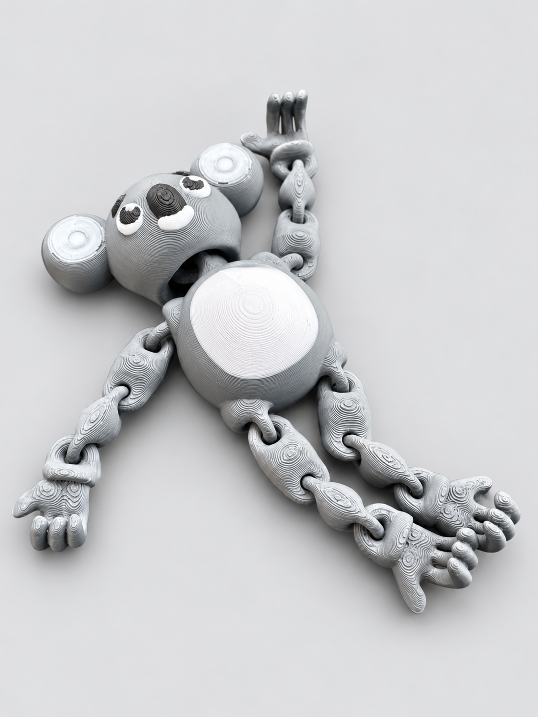 Articulated koala fidget toy angled view