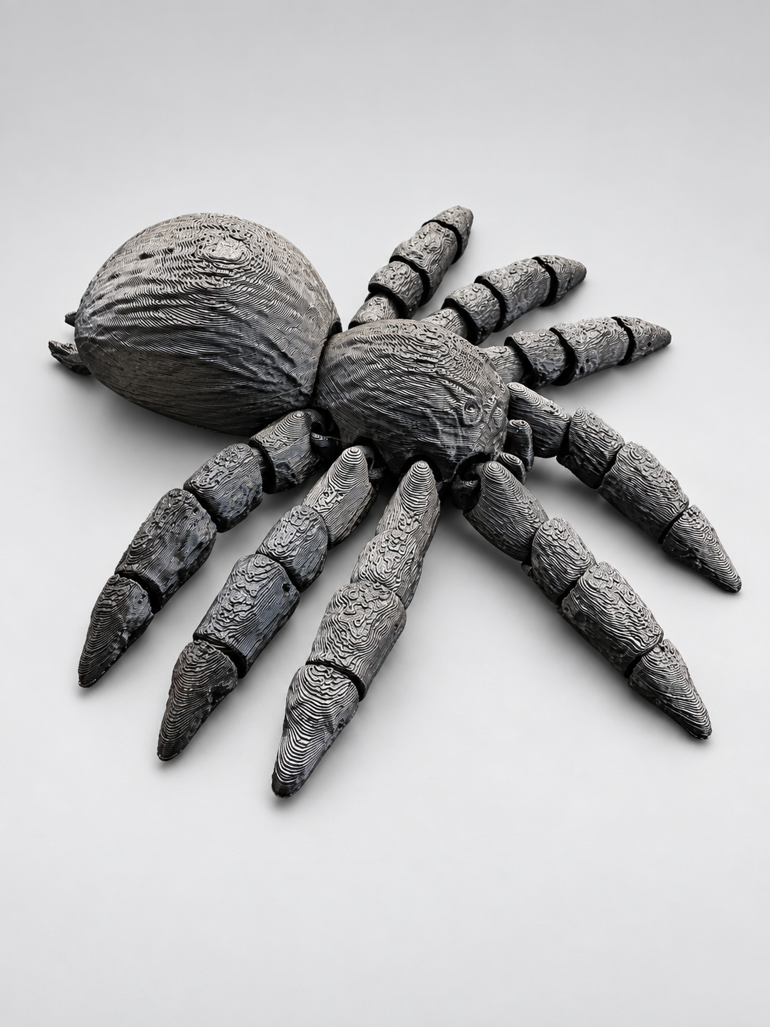 Articulated spider fidget close three-quarter view
