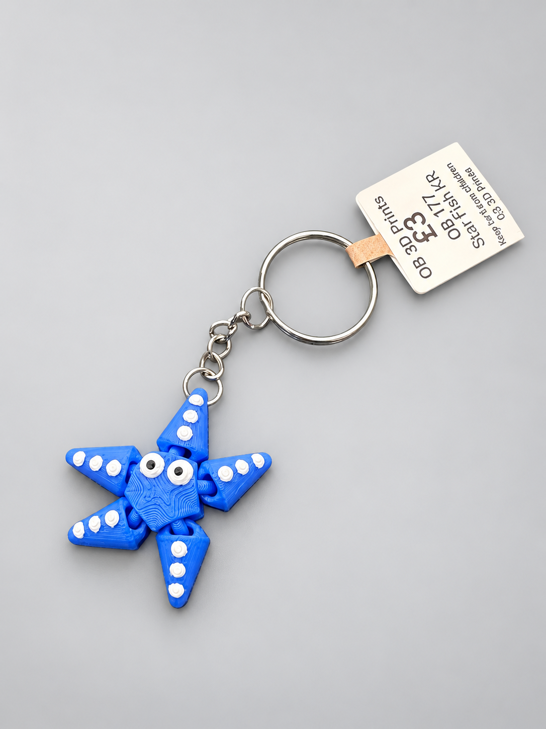 Blue articulated starfish keychain