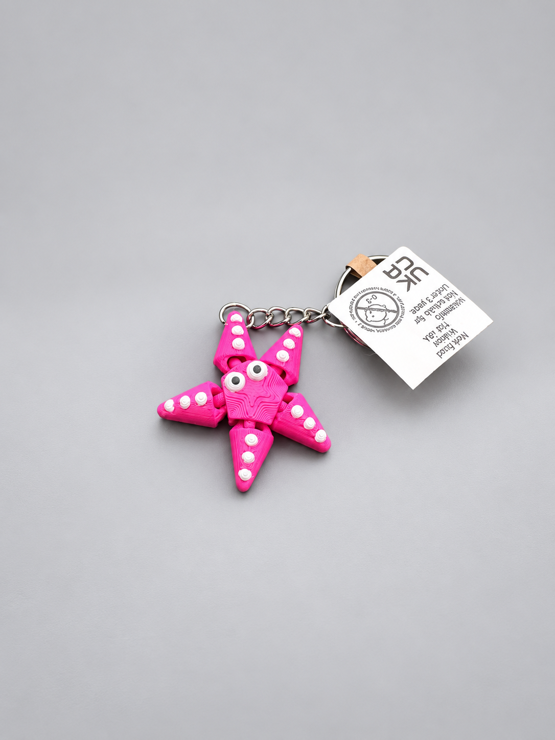 Pink articulated starfish keychain