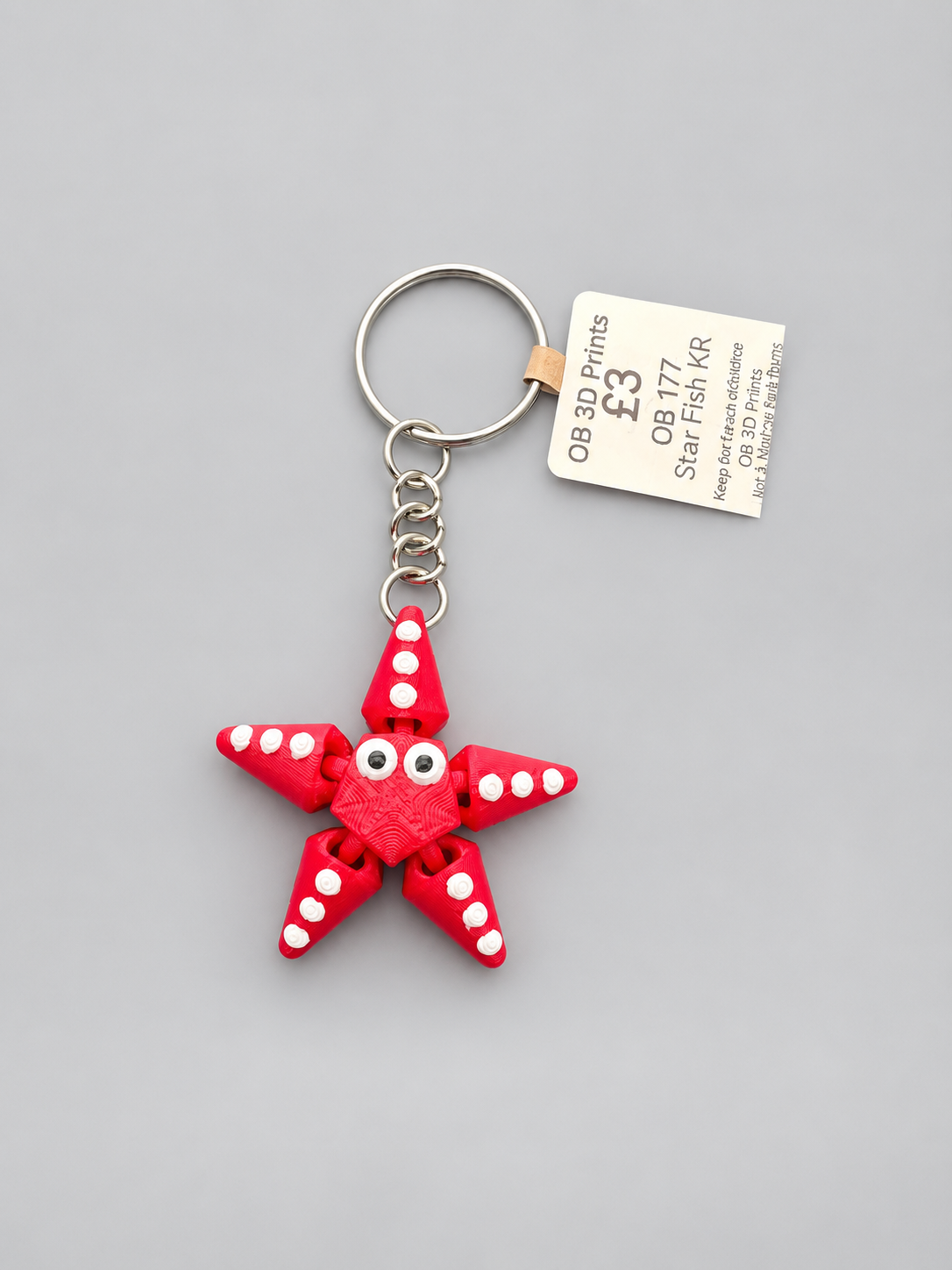 Red articulated starfish keychain