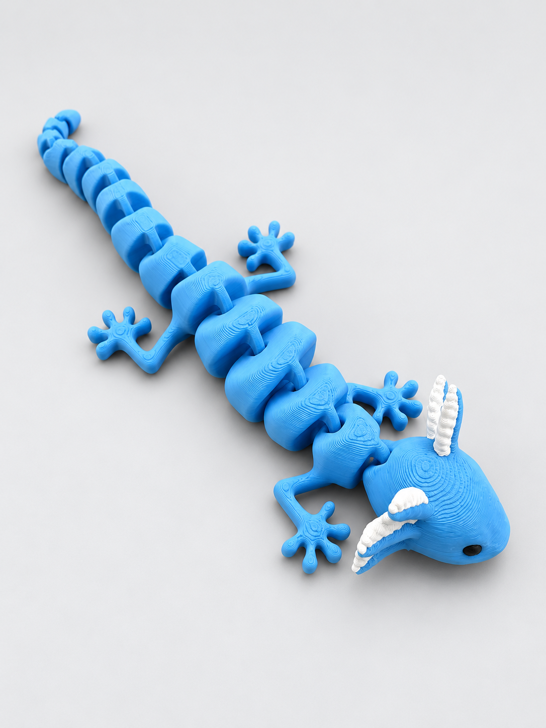 Blue articulated axolotl angled view