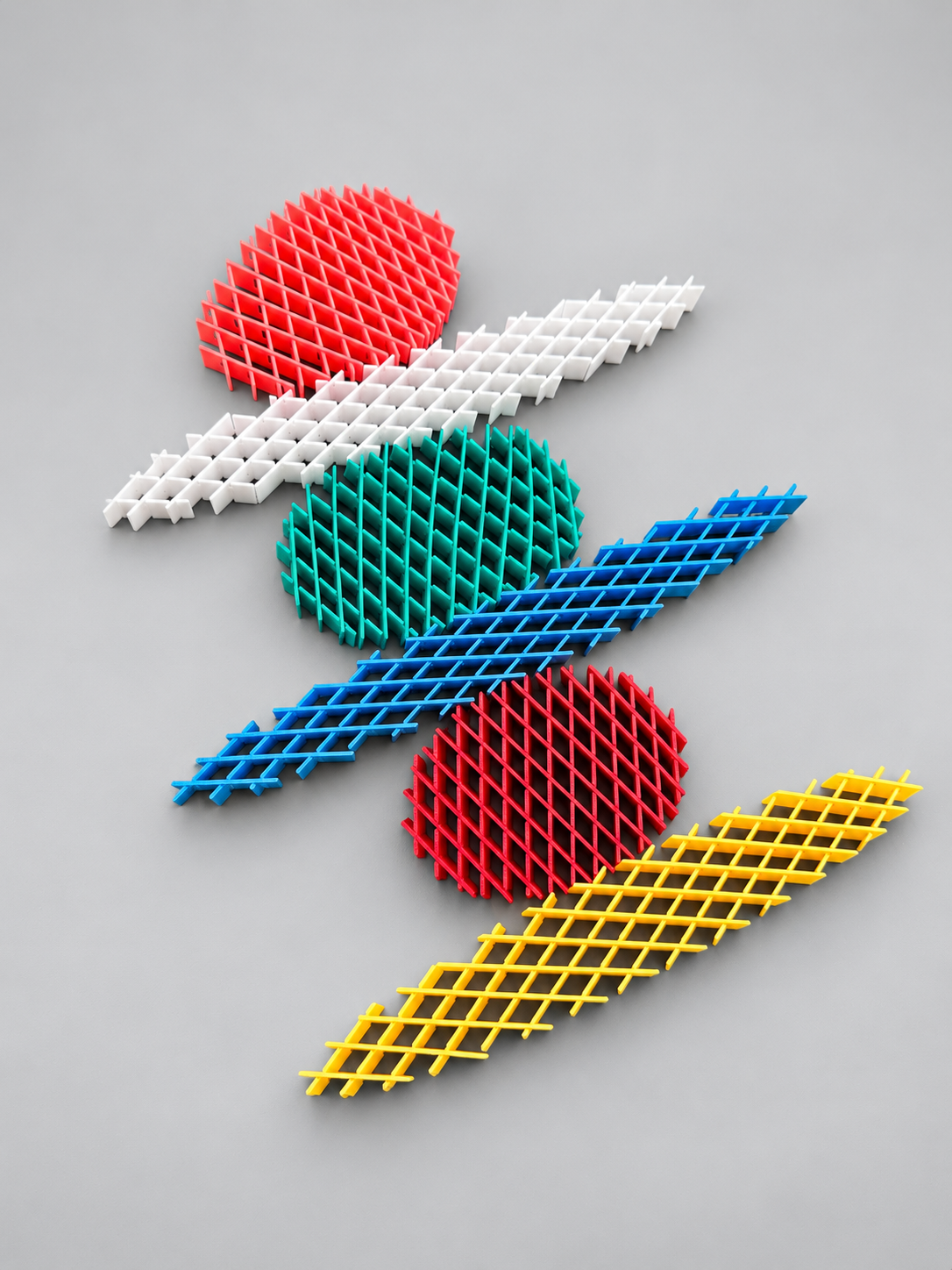 Fidget sheets in assorted colours shown compressed and extended