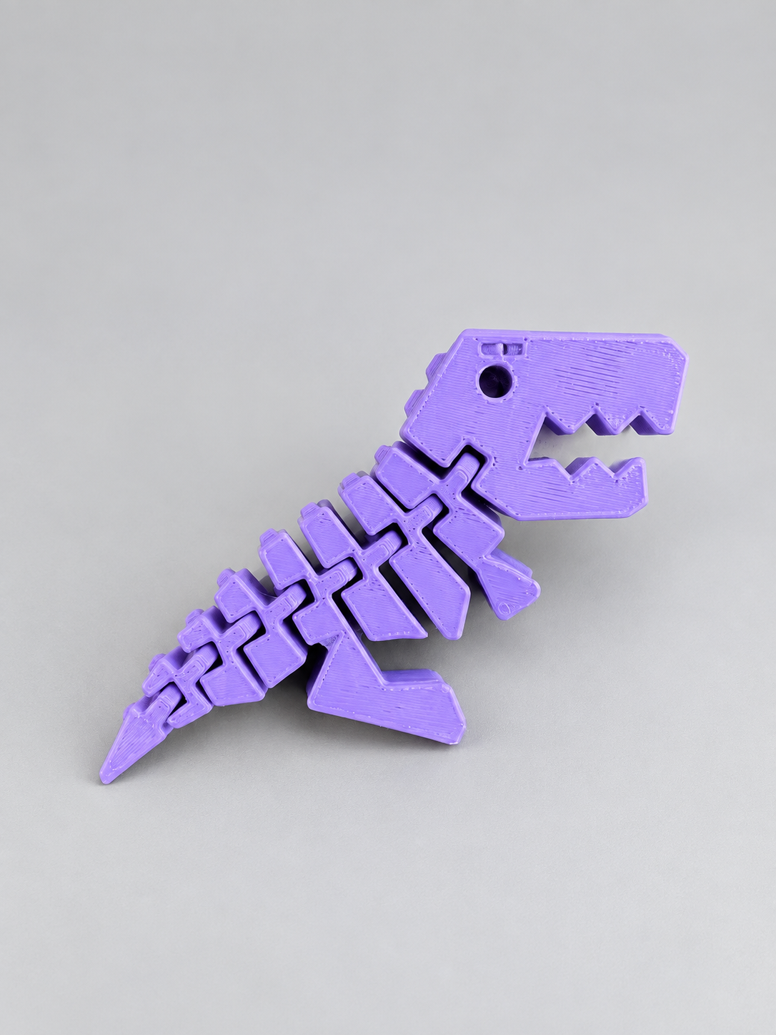 Purple Flexi Rexies articulated dinosaur fidget
