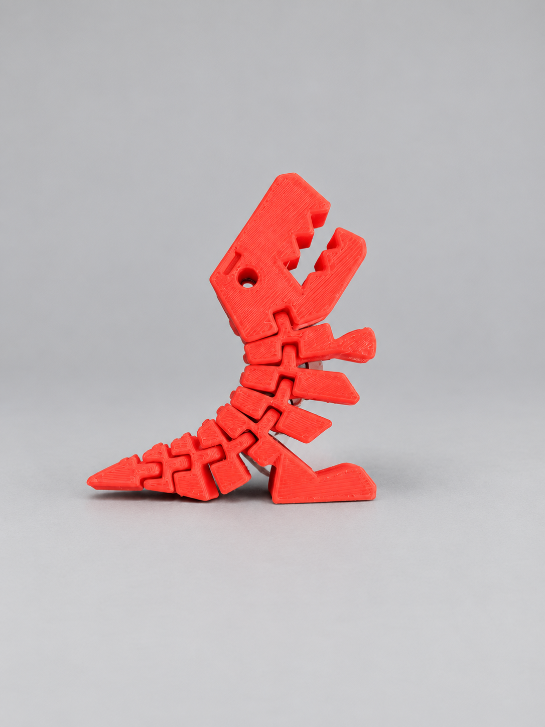 Red Flexi Rexies articulated dinosaur fidget