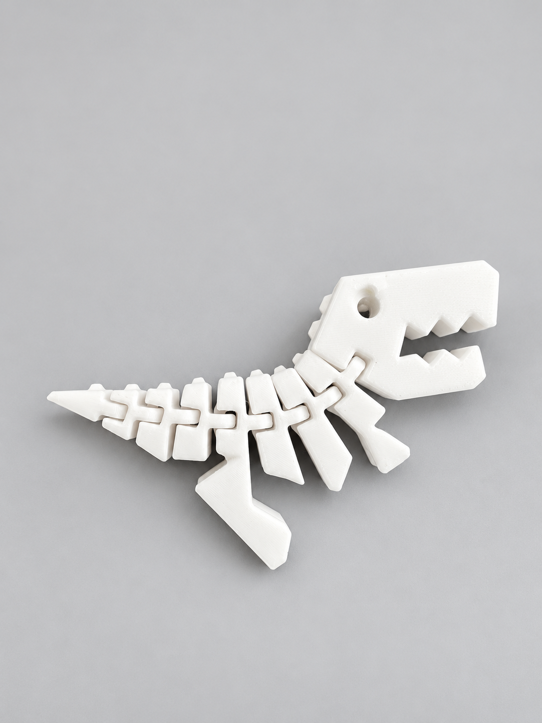 White Flexi Rexies articulated dinosaur fidget