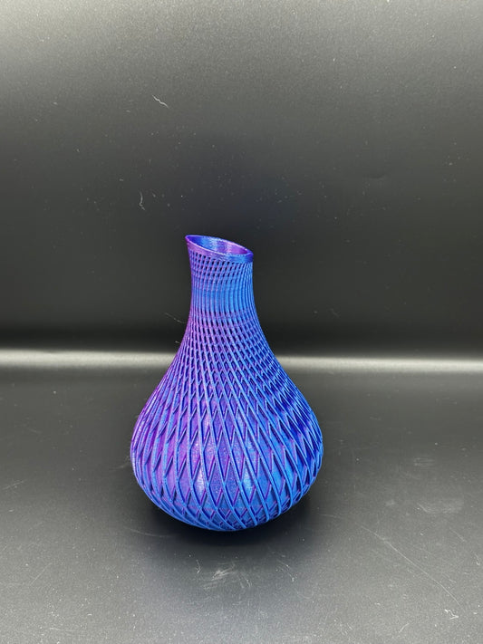 Fluted spiral vase in a metallic blue and purple finish
