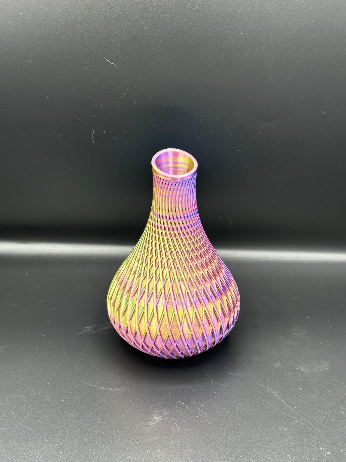 Fluted spiral vase in a metallic multicolour finish