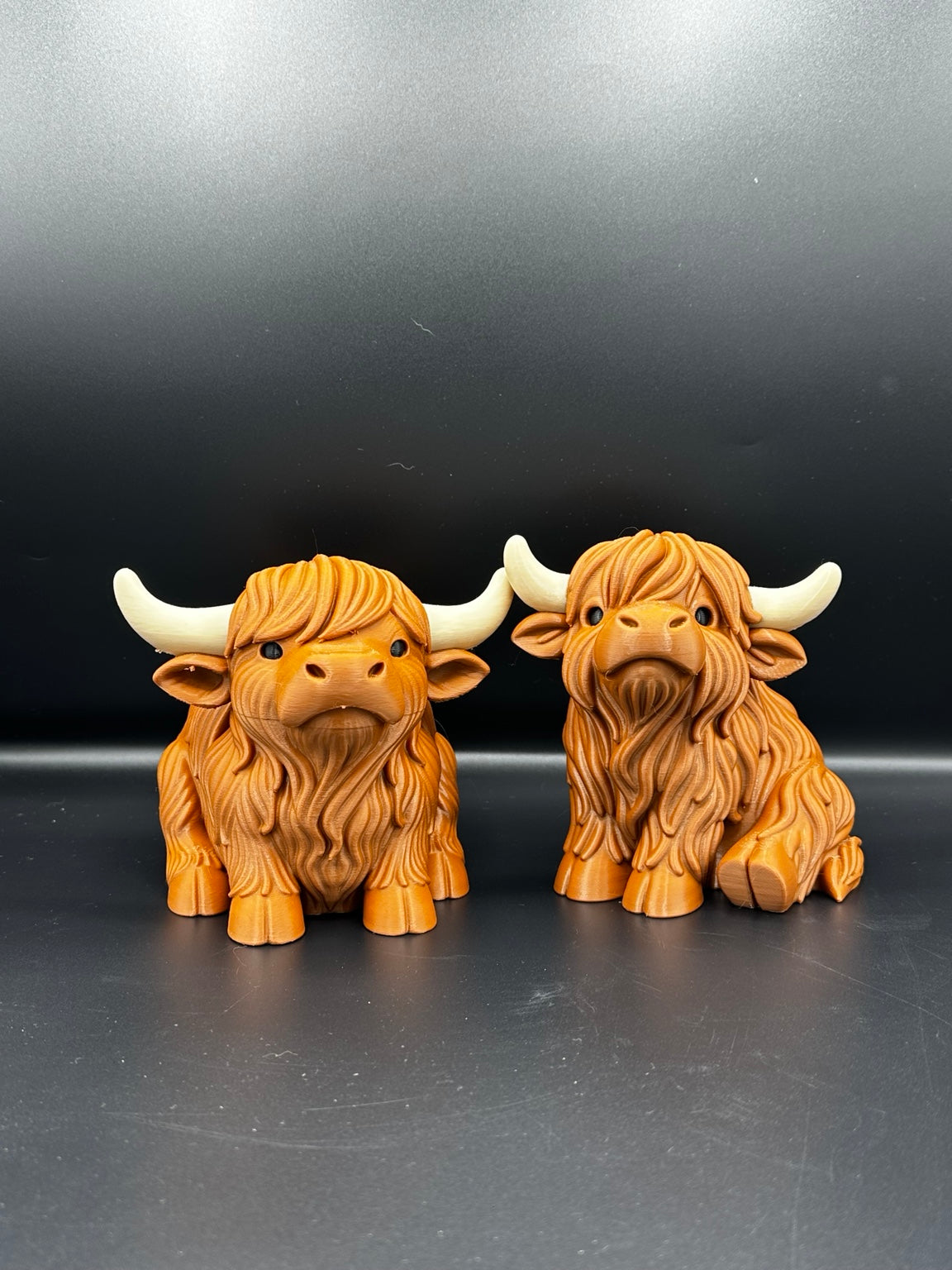 Highland cow ornament and pen pot together