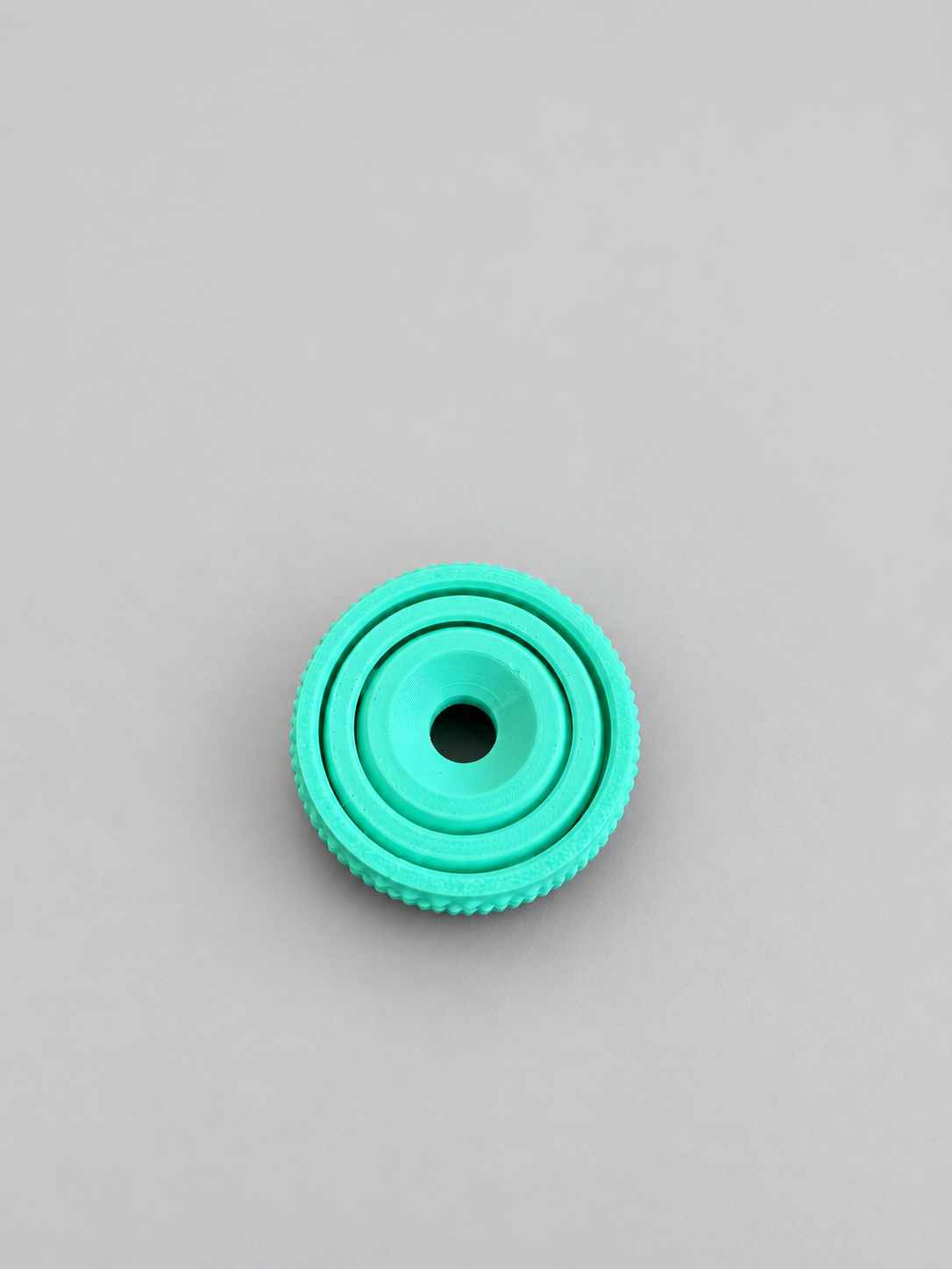 Mint green fidget gyro spinner
