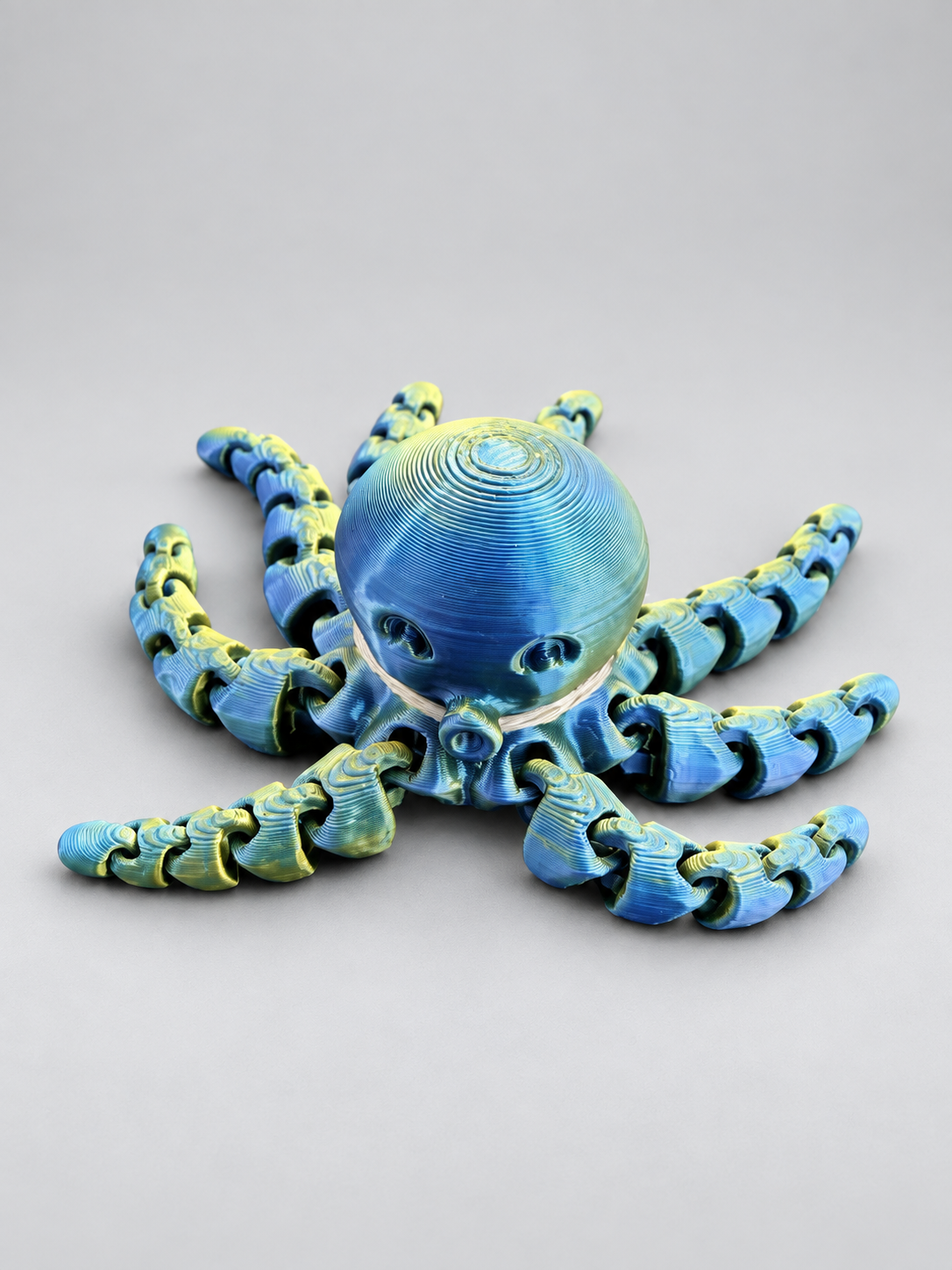 Blue and green mini articulated octopus