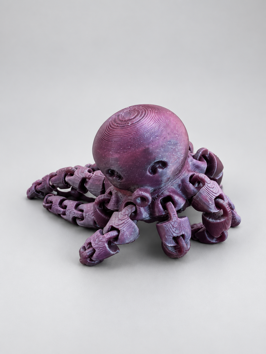 Shimmery purple mini articulated octopus