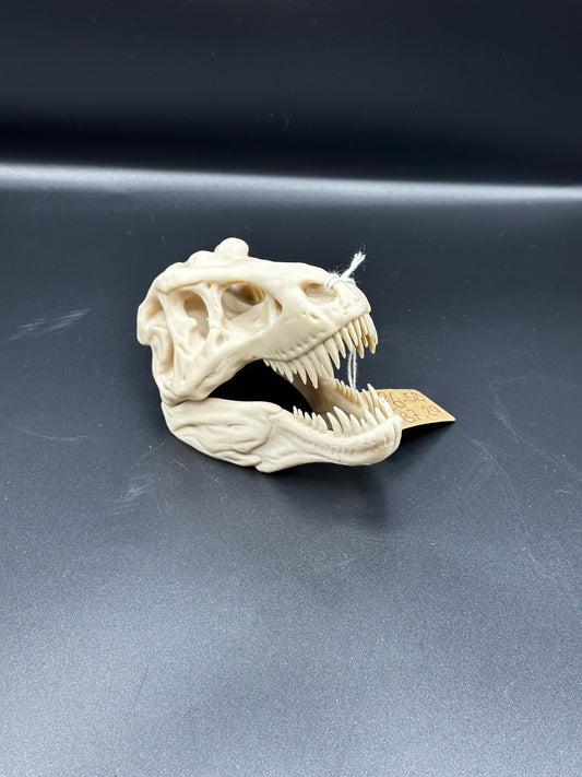Small 3D-printed T-Rex skull ornament with open jaw