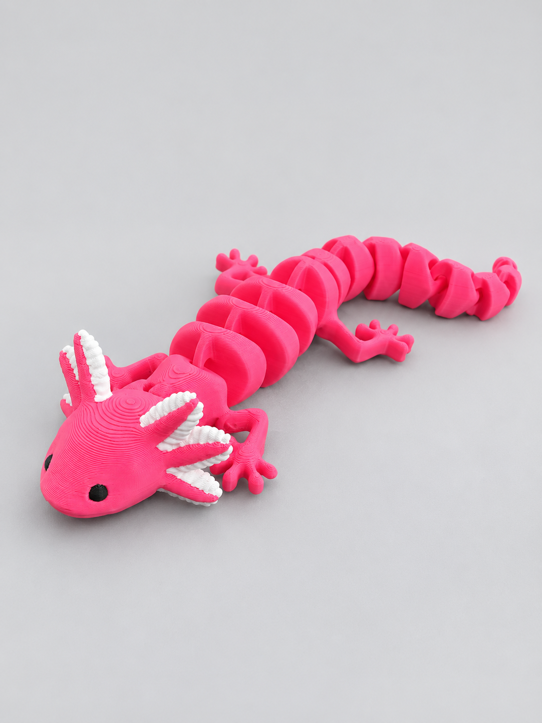 Pink articulated axolotl angled view
