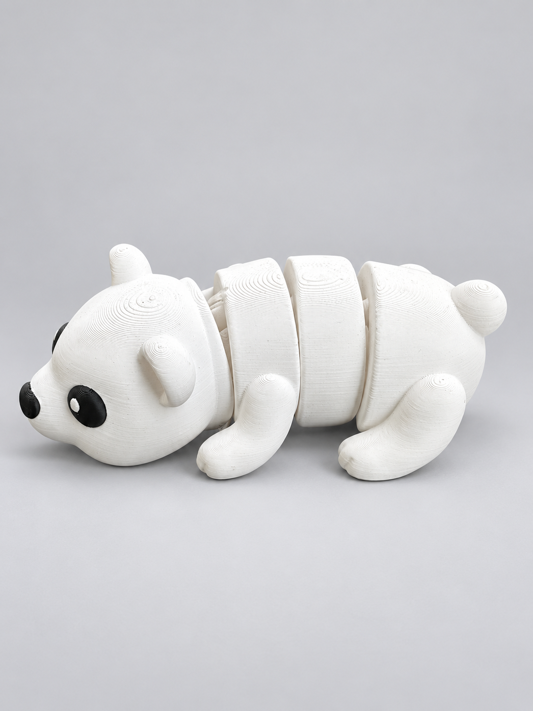Articulated polar bear fidget side view